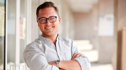 Portrait Of Smiling Male School Teacher Standing I 2021 08 26 16 13 34 Utc