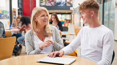 Teacher Talks To Student In Communal Area Of Colle 2021 08 26 16 13 47 Utc
